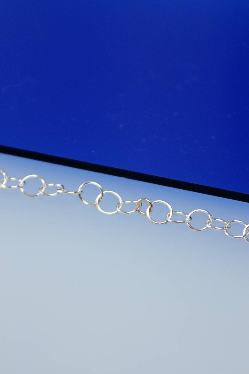 Armband Orbit | Lijn van zilveren en gouden cirkels