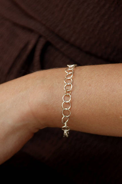 Armband Orbit | Lijn van zilveren en gouden cirkels